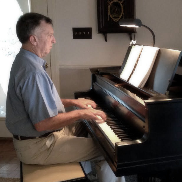 Stan Pethel playing piano.